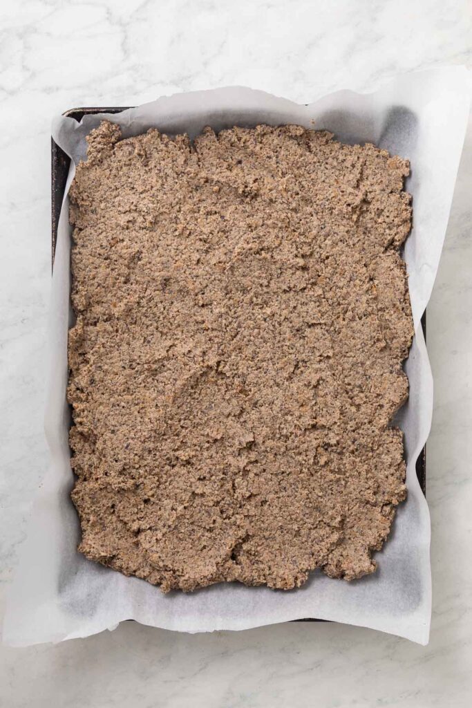 Raw vegetarian ground beef mixture on a sheet pan.