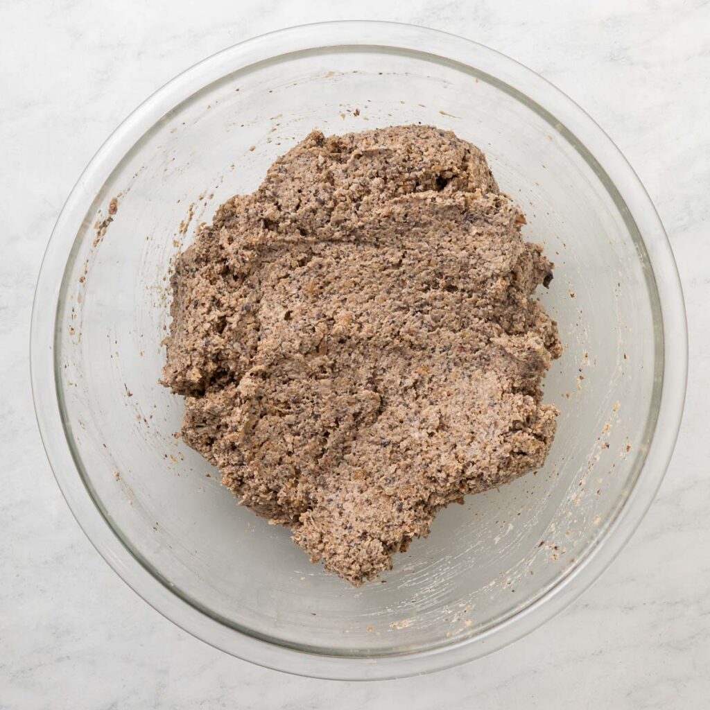 Raw vegetarian ground beef mixture in a glass bowl.