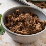 Vegetarian ground beef in a small bowl.